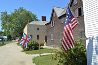 Portsmouth, NH - Strawbery Banke - Flags and Street Near Sherburne House